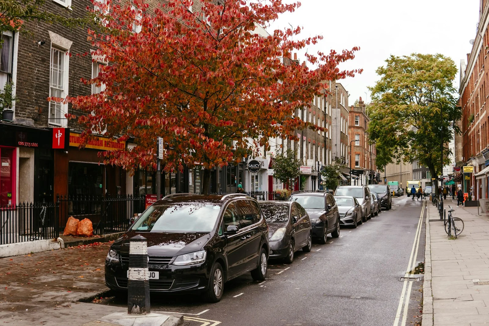 a street with cars parked along it